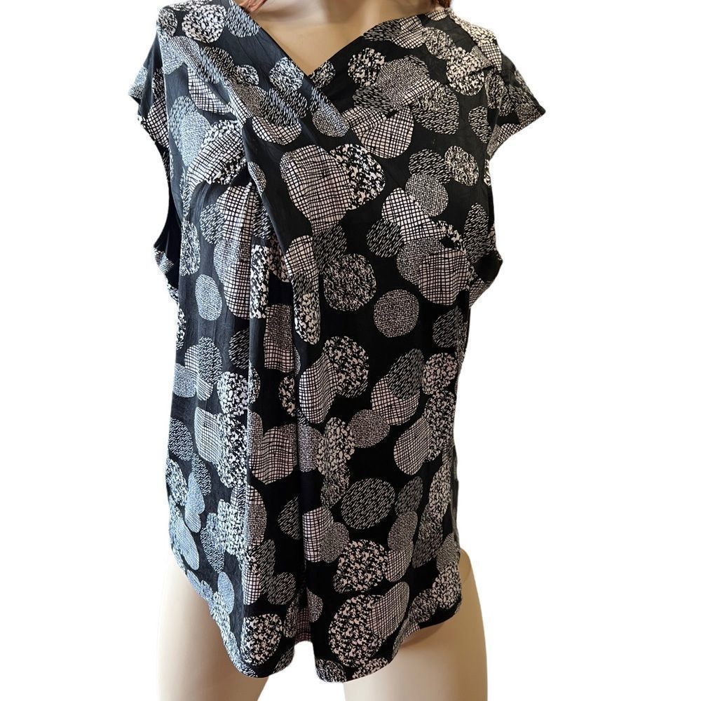 Criss Cross black and white dotted top by Not Just Pants